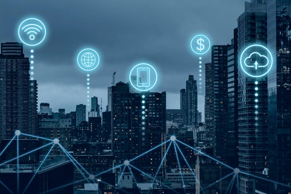 City skyline overlaid with connected network icons representing smart infrastructure